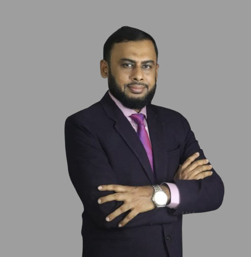 Allama Tasadduq Ilias in a professional portrait